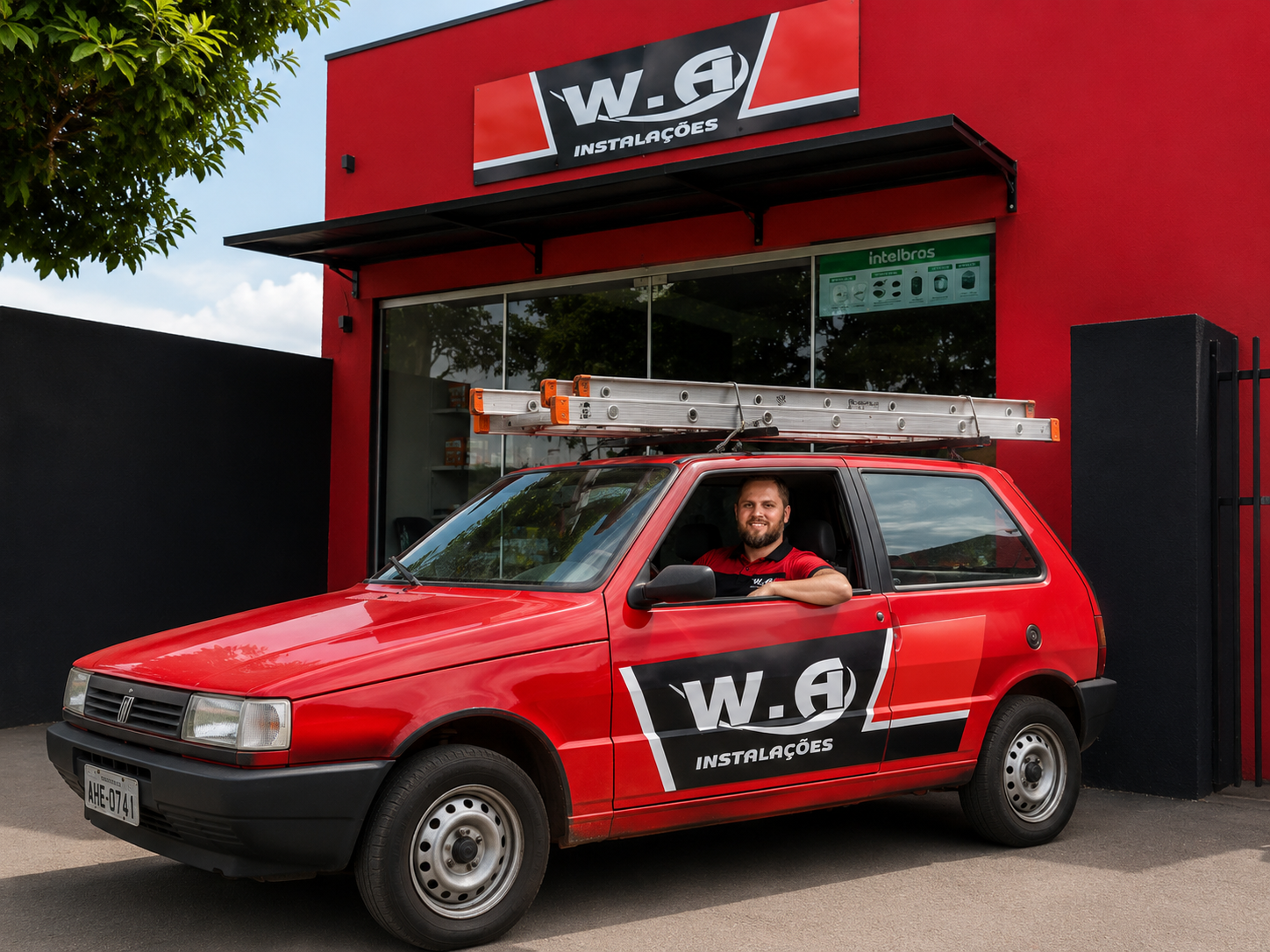 Veículo da W.A Instalações em frente à loja